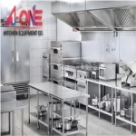 Top commercial kitchen equipment setup featuring heavy-duty stainless steel ranges, griddles, and professional cookware.