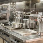 Top commercial kitchen equipment setup featuring heavy-duty stainless steel ranges, griddles, and professional cookware.